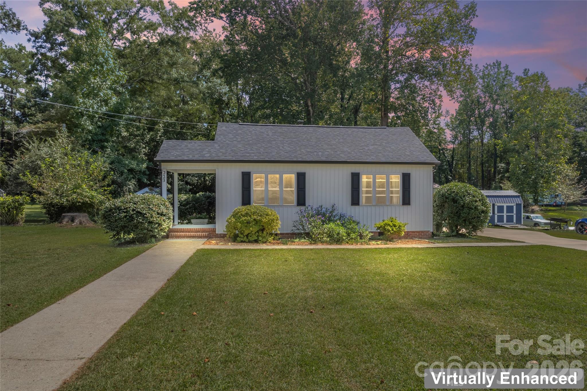 223 Wiley Avenue York, SC 29745 - Photo 40 of 40 a front view of a house with a yard