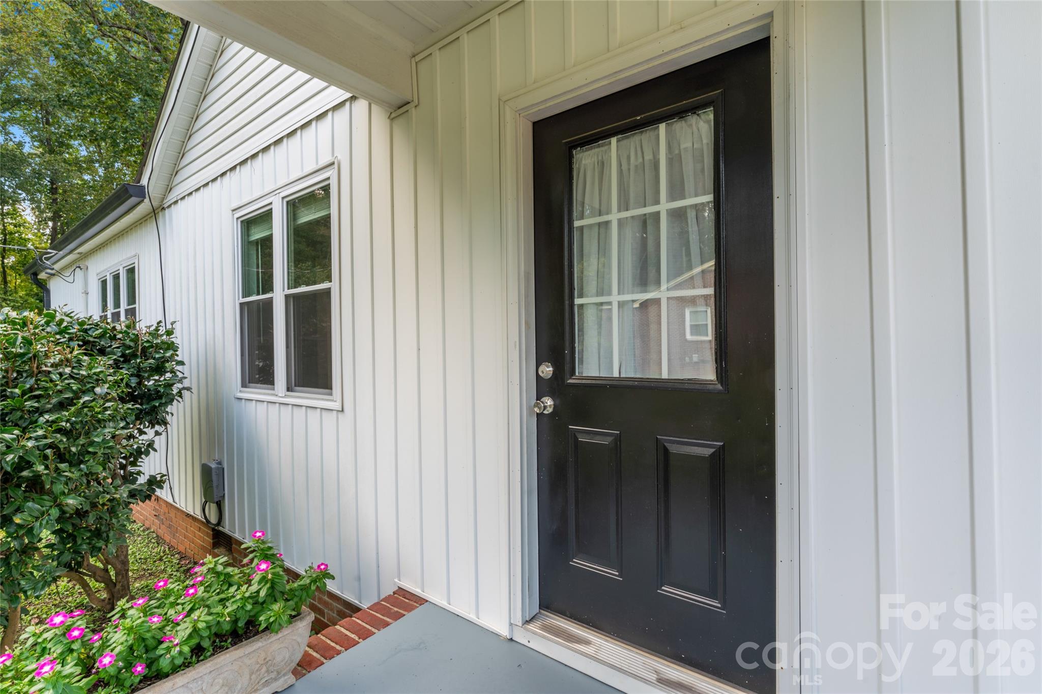 223 Wiley Avenue York, SC 29745 - Photo 4 of 40 a house with flowers in front of it