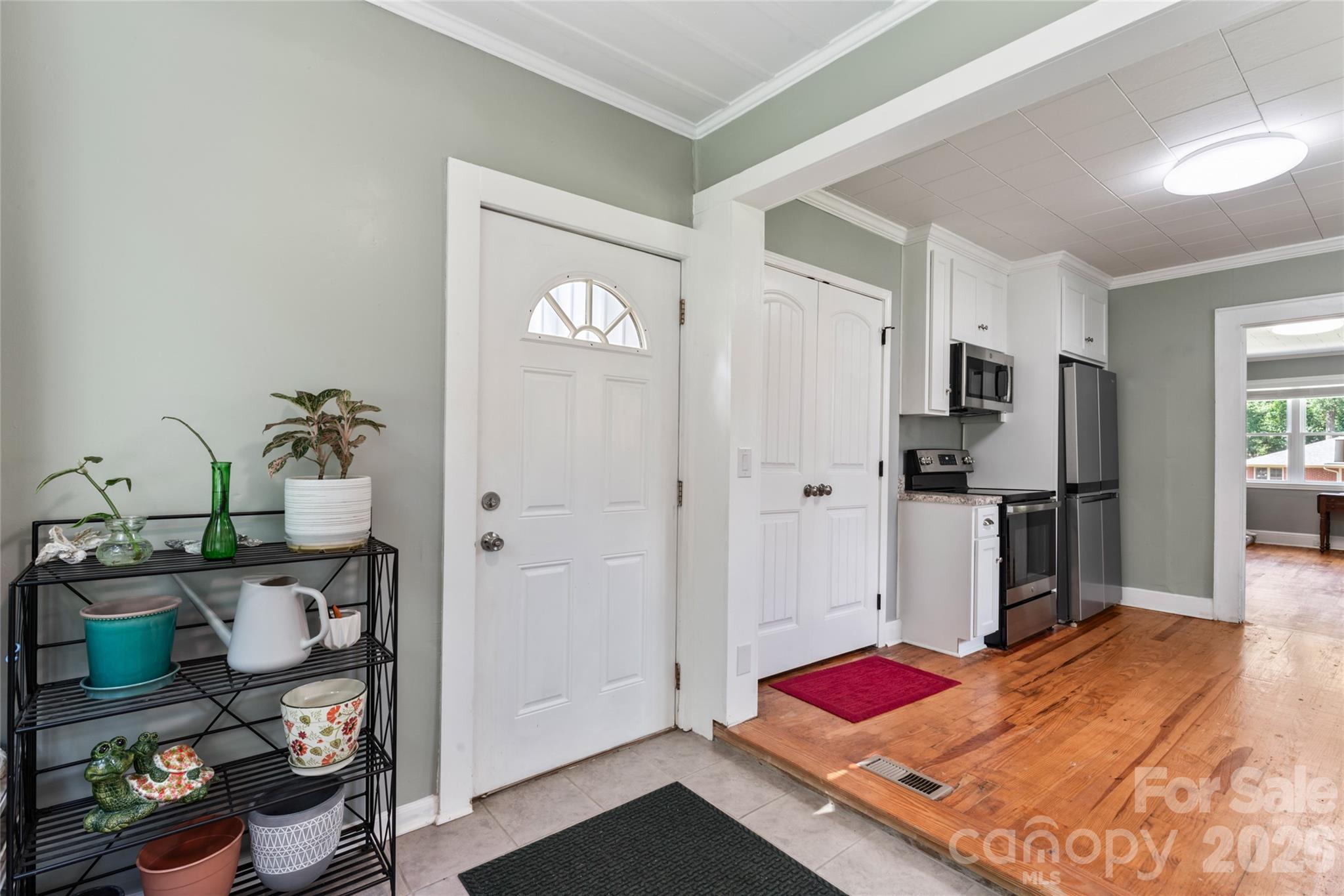 223 Wiley Avenue York, SC 29745 - Photo 9 of 40 a bedroom with furniture and a wooden floor