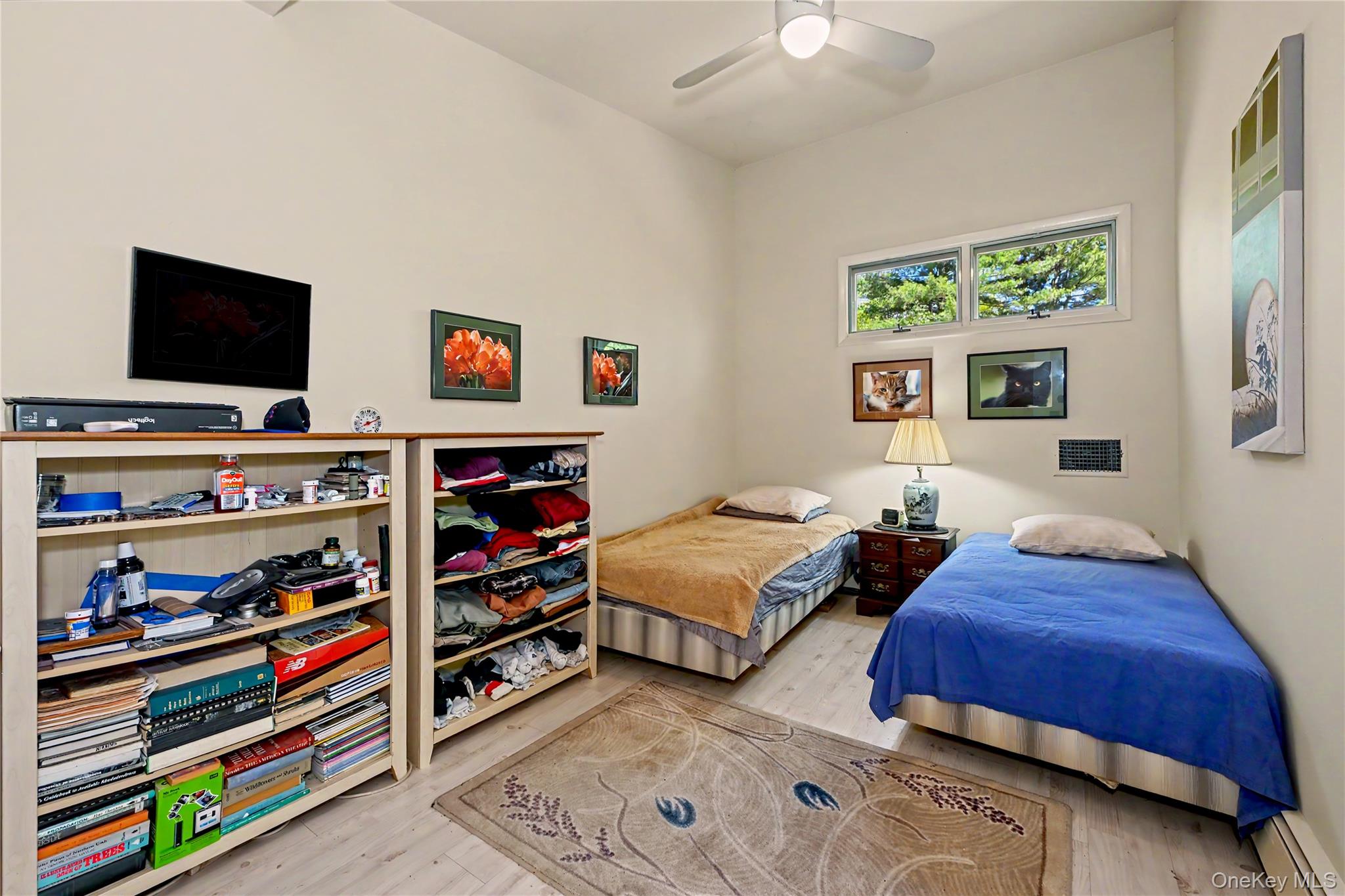 631 Croton Falls Road Carmel, NY 10512 - Photo 25 of 43 a bedroom with furniture and a flat screen tv