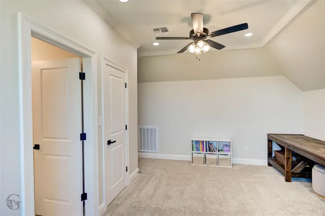 a view of a house with backyard and porch