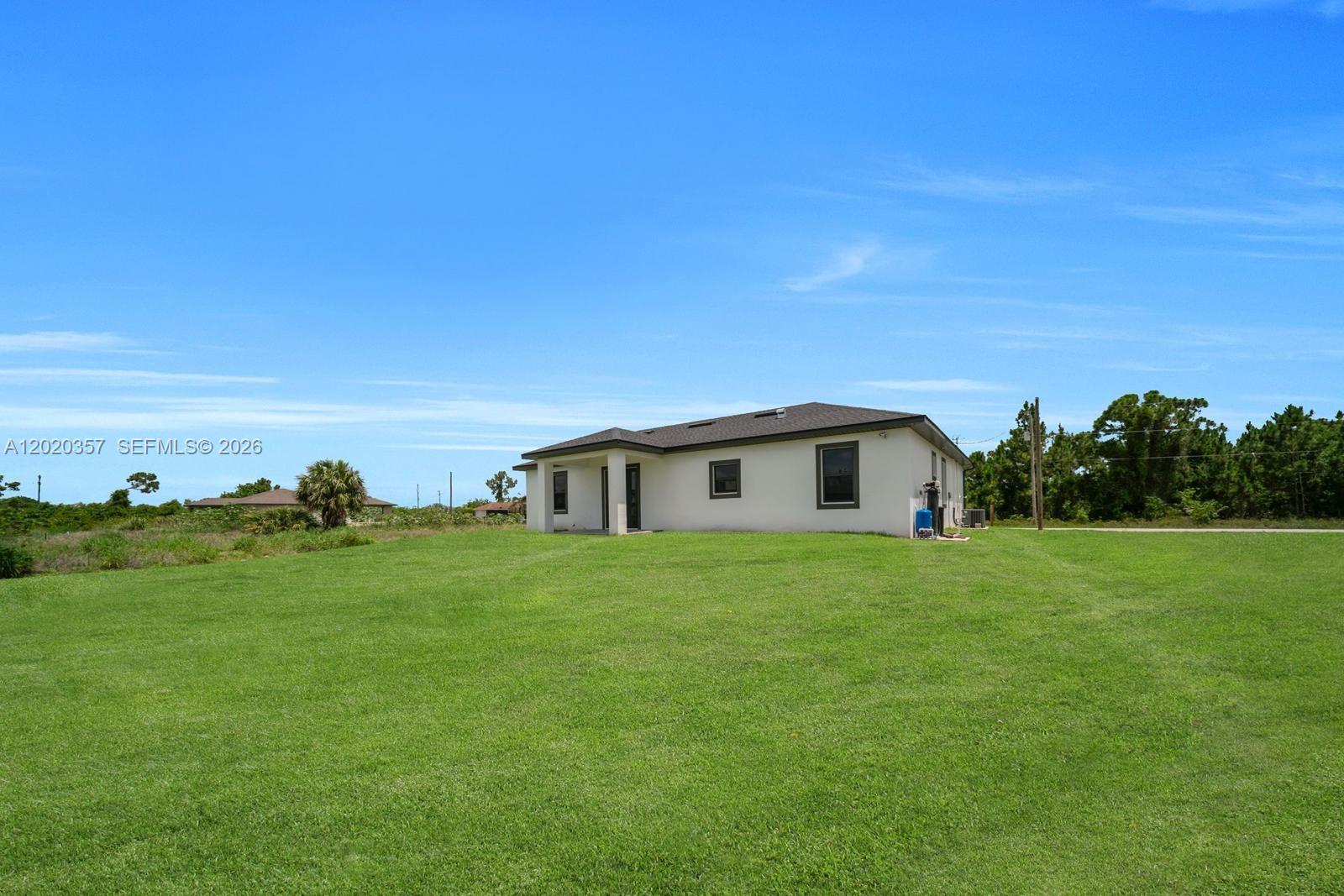3114 39th Street Southwest Lehigh Acres, FL 33976 - Photo 2 of 5
