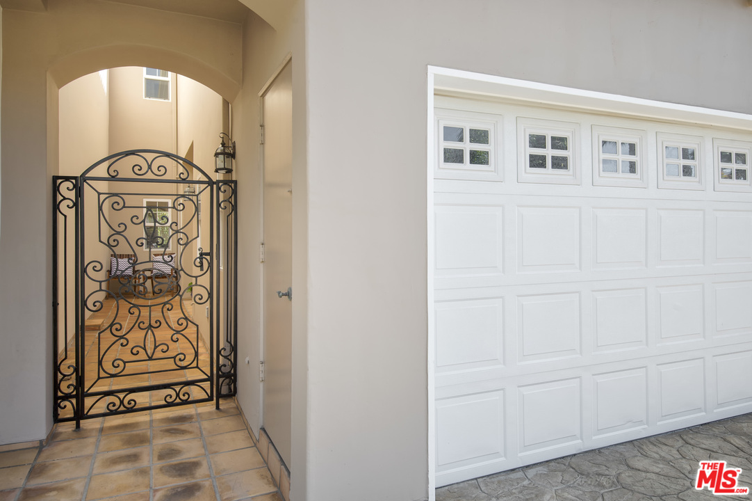 6450 Lunita Road, Unit 122 Malibu, CA 90265 - Photo 24 of 32 a view of front door with hallway