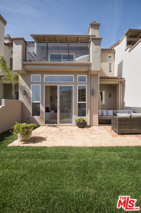 6450 Lunita Road, Unit 122 Malibu, CA 90265 - Photo 25 of 32 front view of a house with a yard