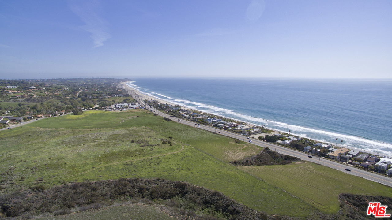 6450 Lunita Road, Unit 122 Malibu, CA 90265 - Photo 26 of 32 a view of a field with an ocean