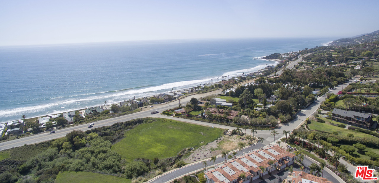 6450 Lunita Road, Unit 122 Malibu, CA 90265 - Photo 27 of 32 a view of a field with an ocean