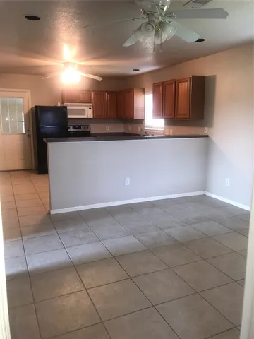 a view of a kitchen with a sink