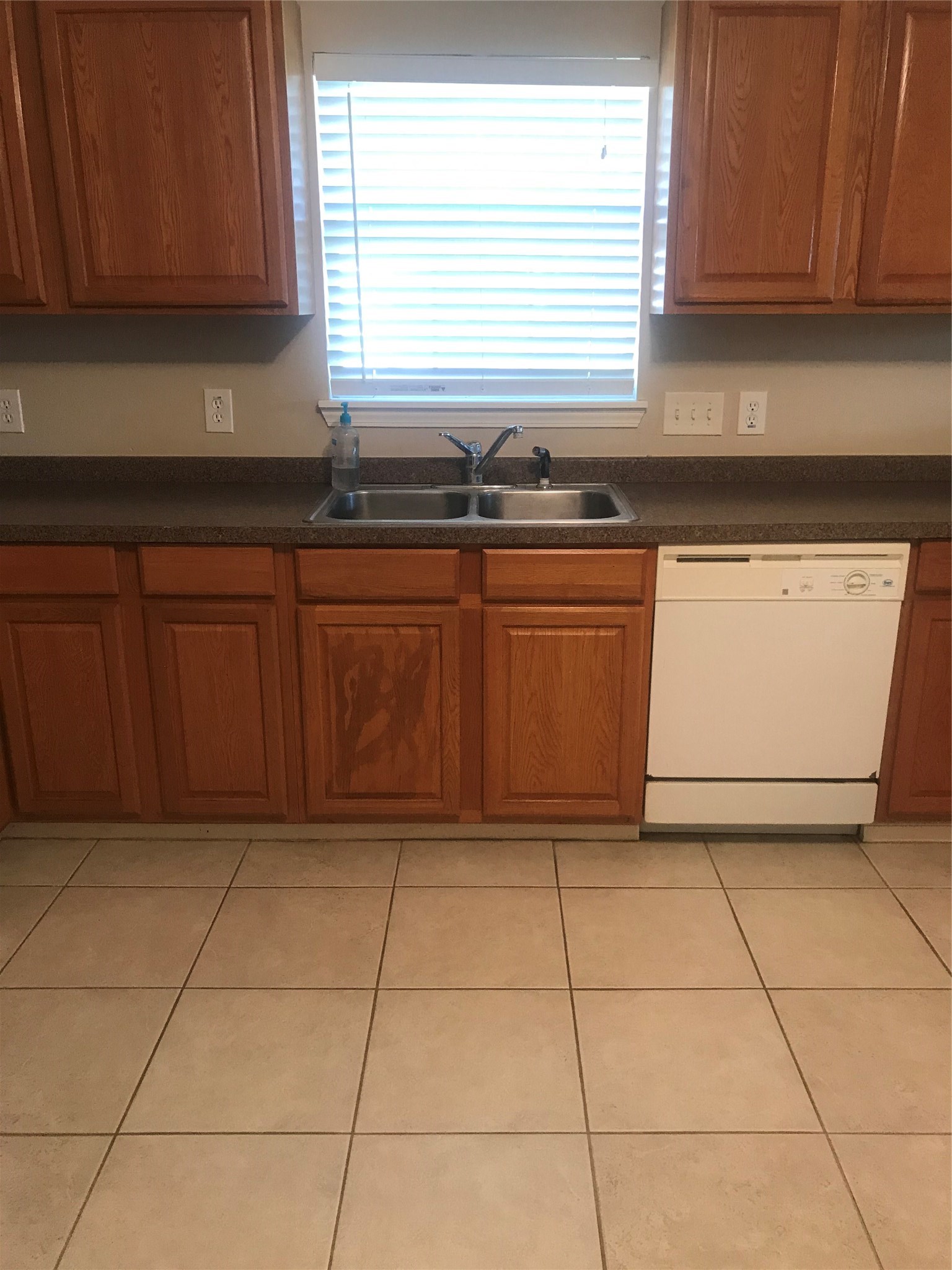 2443 Precinct Line Road Richmond, TX 77406 - Photo 5 of 17 a kitchen with a sink and cabinets