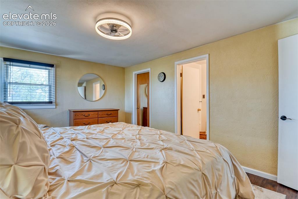10970 Garrett Road Peyton, CO 80831 - Photo 15 of 50 a bedroom with a bed and a window