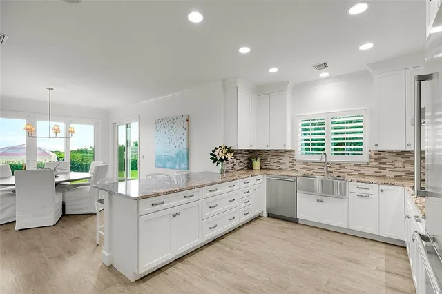 a kitchen with sink and window