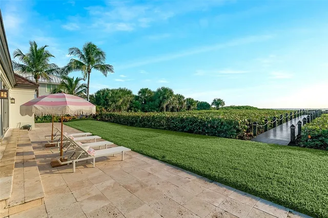 a lawn chairs with an umbrella