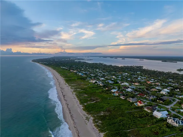 a view of a city with an ocean
