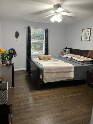 a view of a swimming pool with a yard and swimming pool