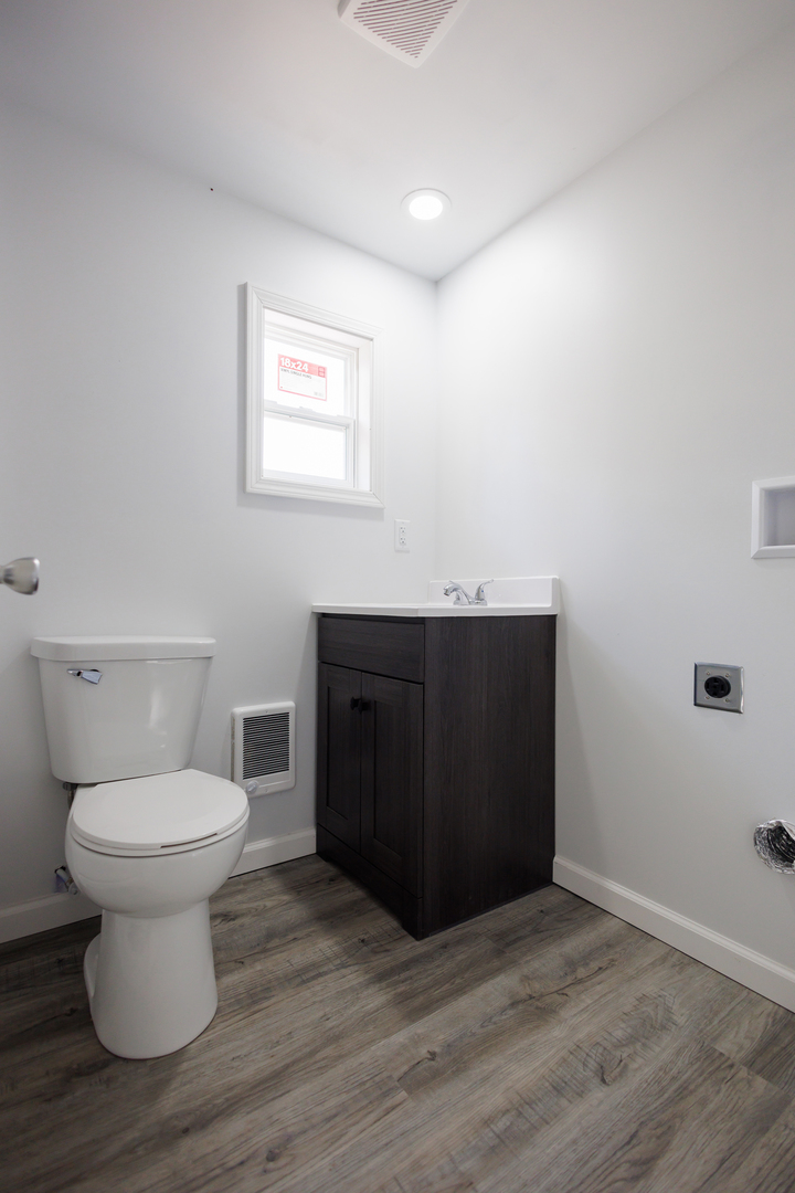 1581 South 16000E Road Pembroke Township, IL 60958 - Photo 15 of 24 a bathroom with a sink and a toilet