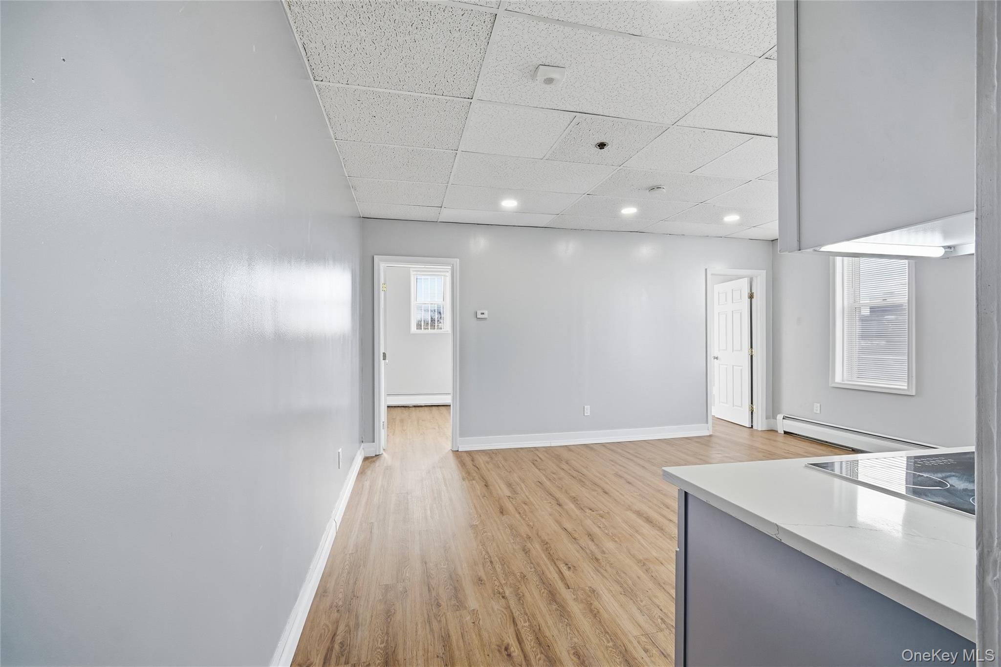 32 B West Main Street, Unit 2 Bay Shore, NY 11706 - Photo 6 of 16 a bathroom with a sink and a mirror
