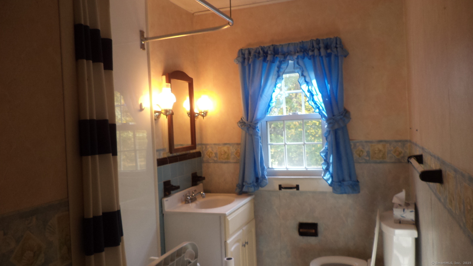 280 Newtown Turnpike Redding, CT 06896 - Photo 11 of 27 a bathroom with a sink a toilet and a window