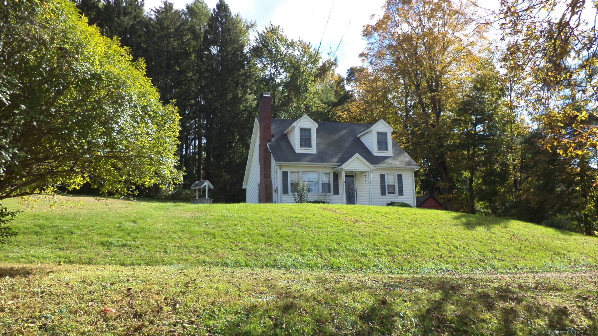 280 Newtown Turnpike Redding, CT 06896 - Photo 2 of 27 a white house with a big yard and large trees
