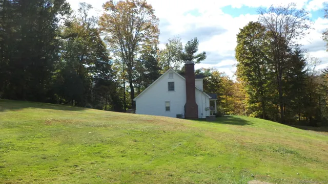 a house with trees in front of it
