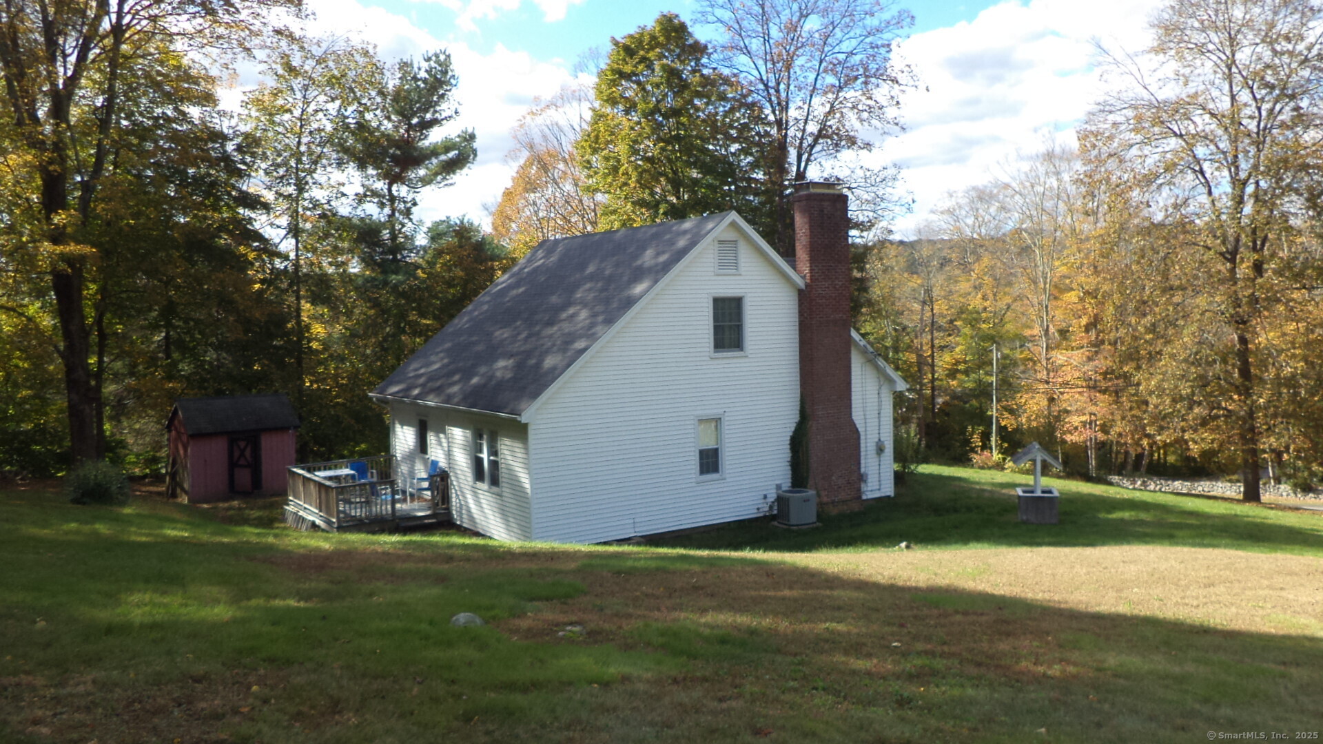 280 Newtown Turnpike Redding, CT 06896 - Photo 4 of 27 a view of a house with backyard and trees