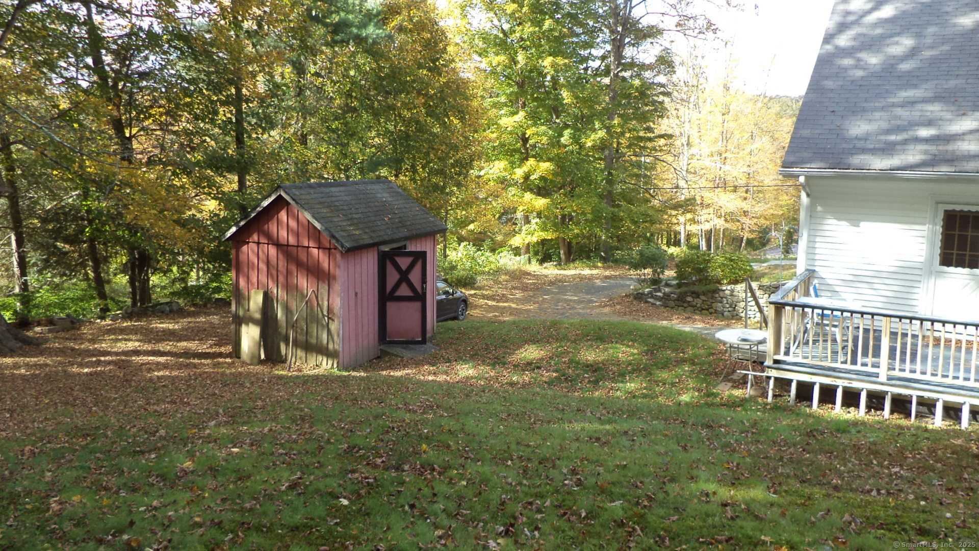 280 Newtown Turnpike Redding, CT 06896 - Photo 6 of 27 a view of a house with a yard