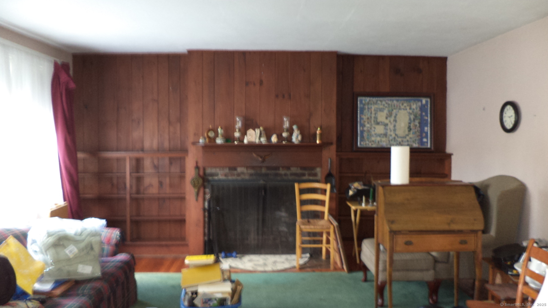 280 Newtown Turnpike Redding, CT 06896 - Photo 8 of 27 a living room with furniture and a fireplace