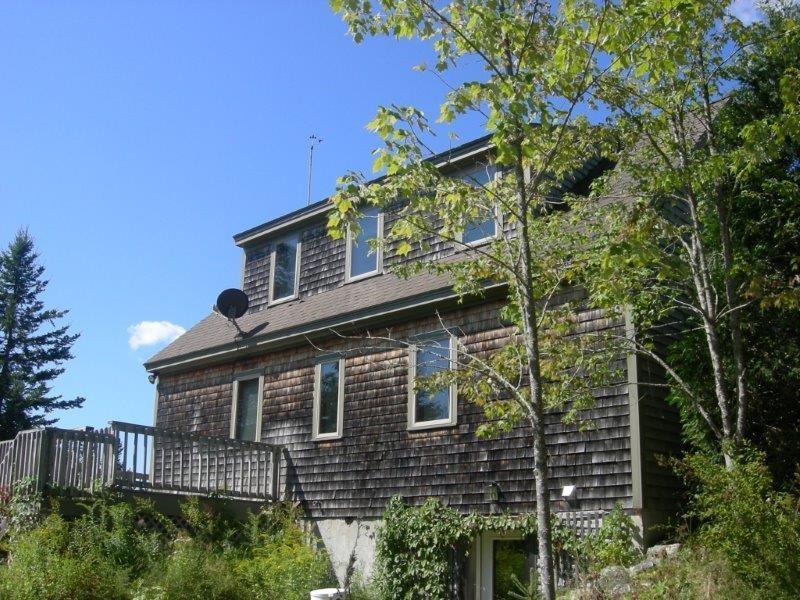 462 Gray Town Road Sedgwick, ME 04676 - Photo 32 of 32 East side of house with wrap-around...