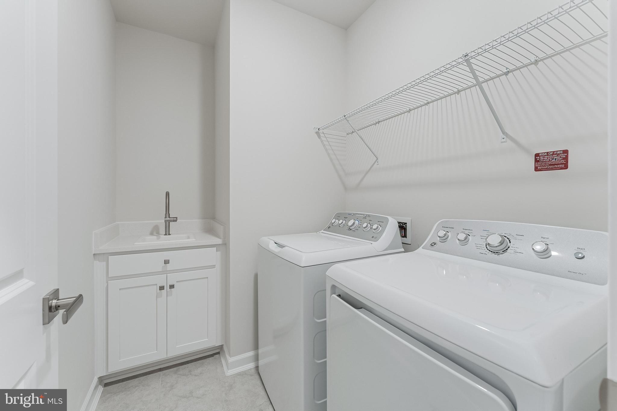 21815 Express Terrace Ashburn, VA 20147 - Photo 19 of 37 a utility room with dryer and washer