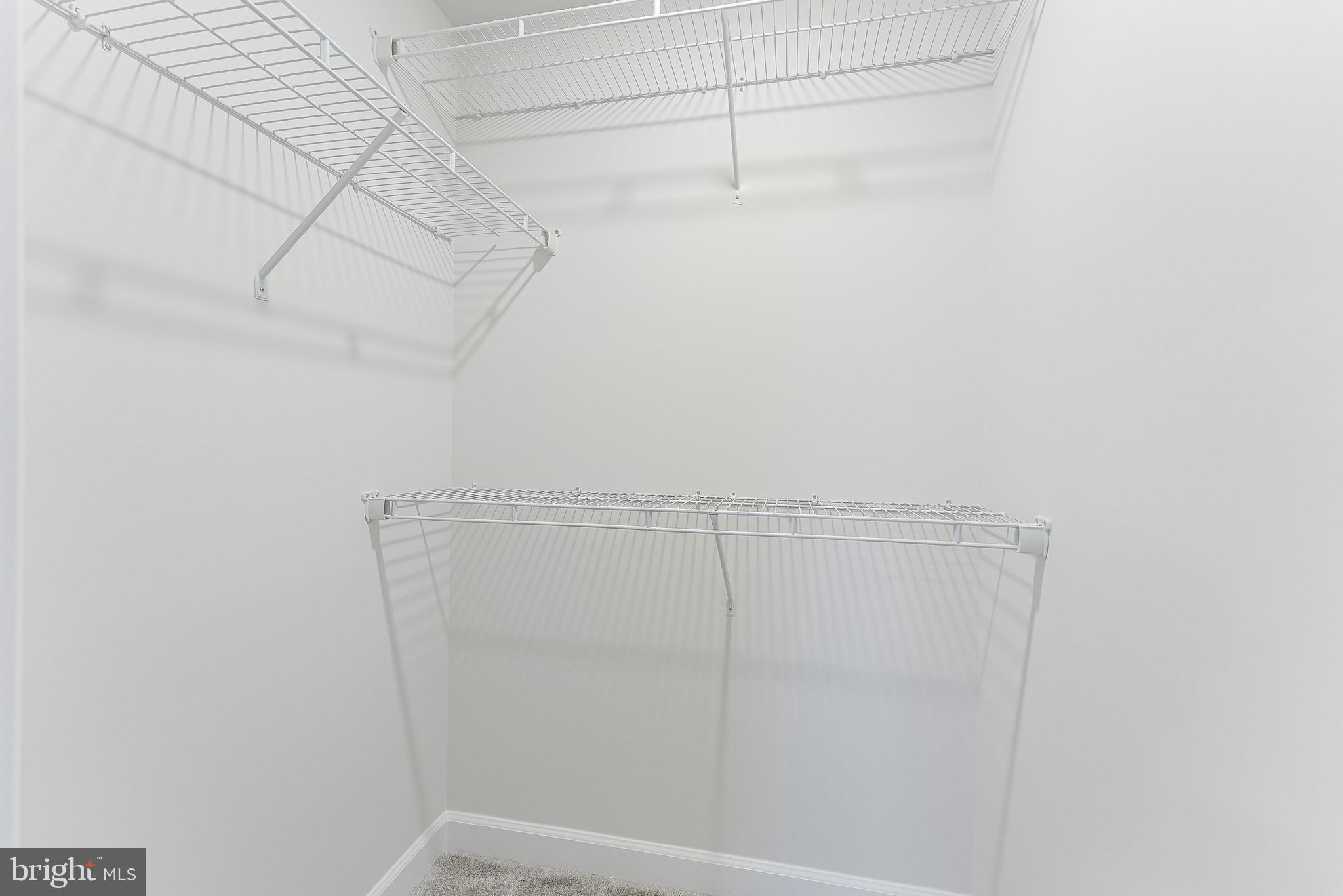 21815 Express Terrace Ashburn, VA 20147 - Photo 23 of 37 a view of a room with racks on the wall