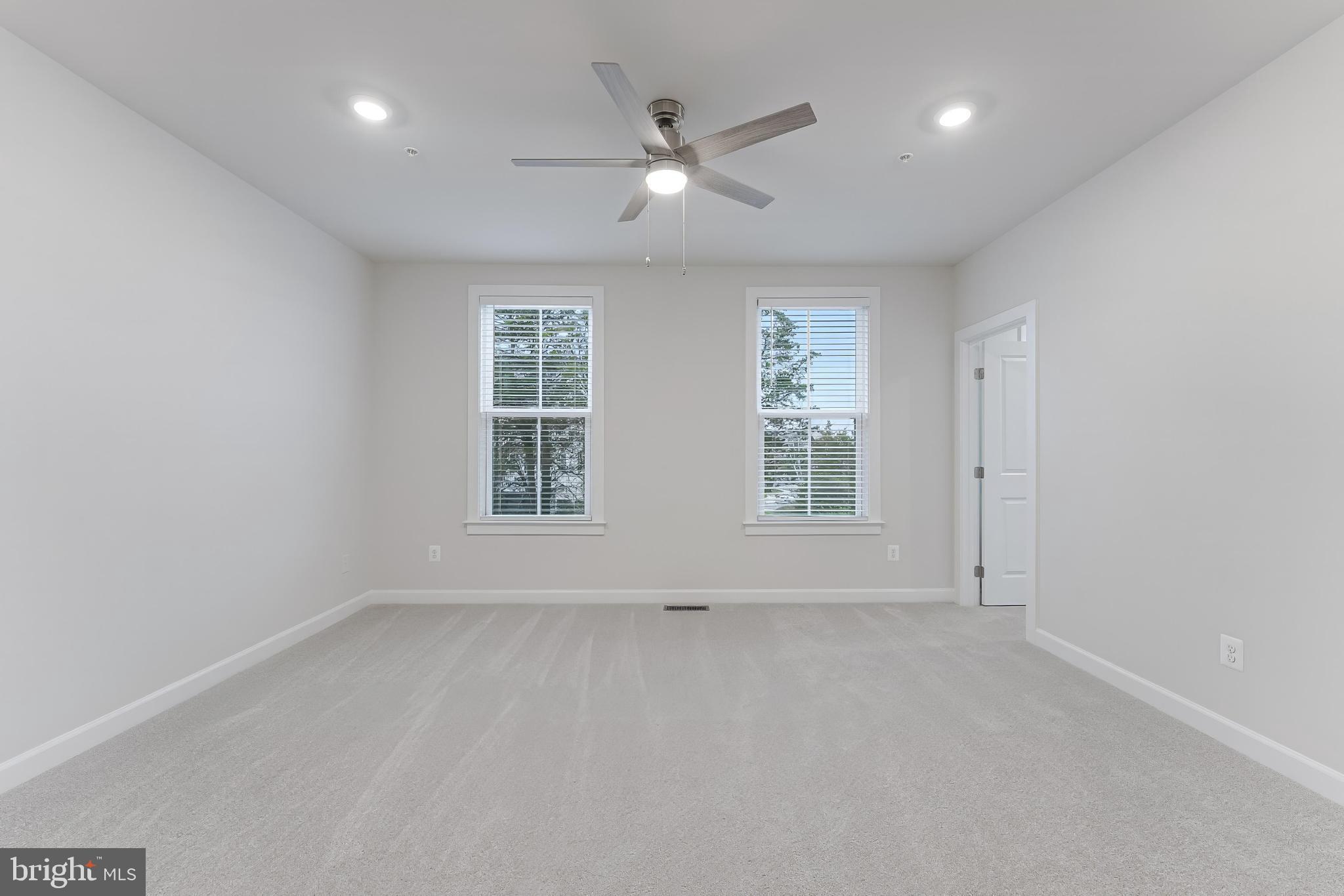 21815 Express Terrace Ashburn, VA 20147 - Photo 27 of 37 an empty room with window and ceiling fan