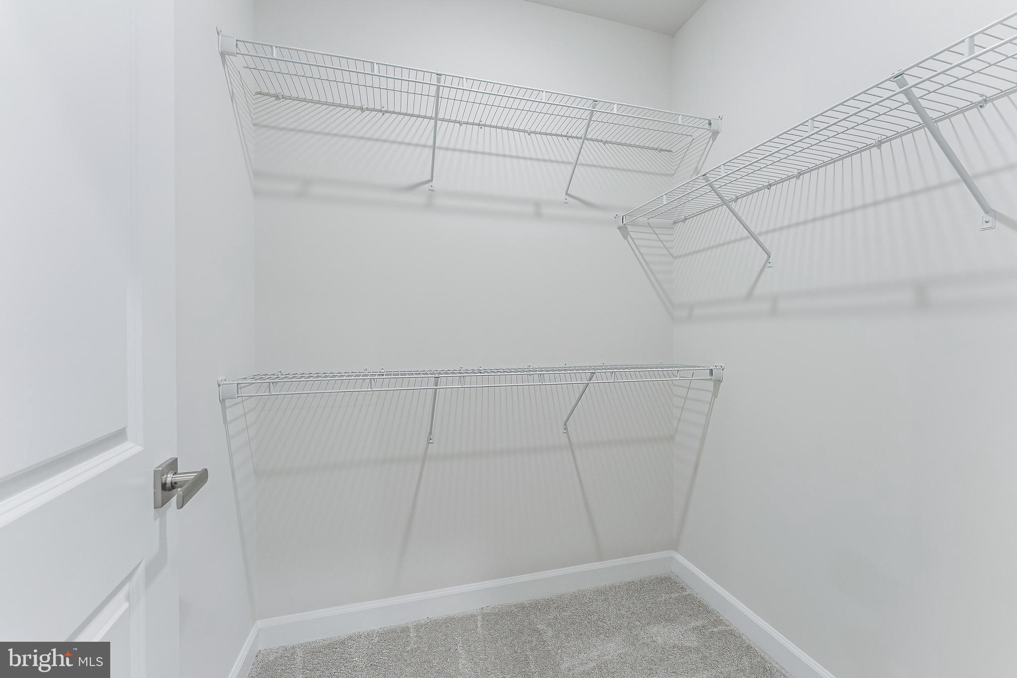 21815 Express Terrace Ashburn, VA 20147 - Photo 32 of 37 a view of a room with racks on the wall