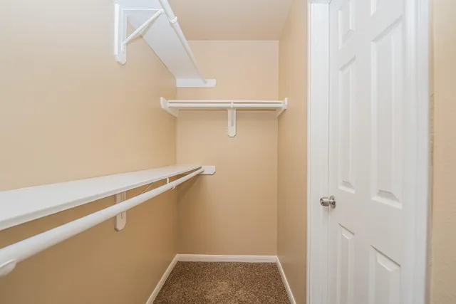 a view of small space with racks on the wall