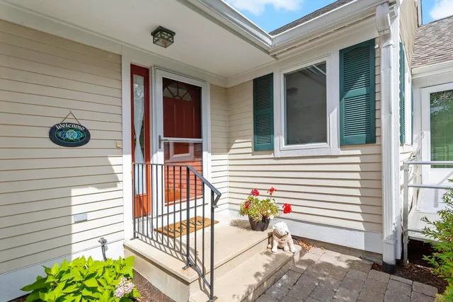 a view of a balcony with a potted plant