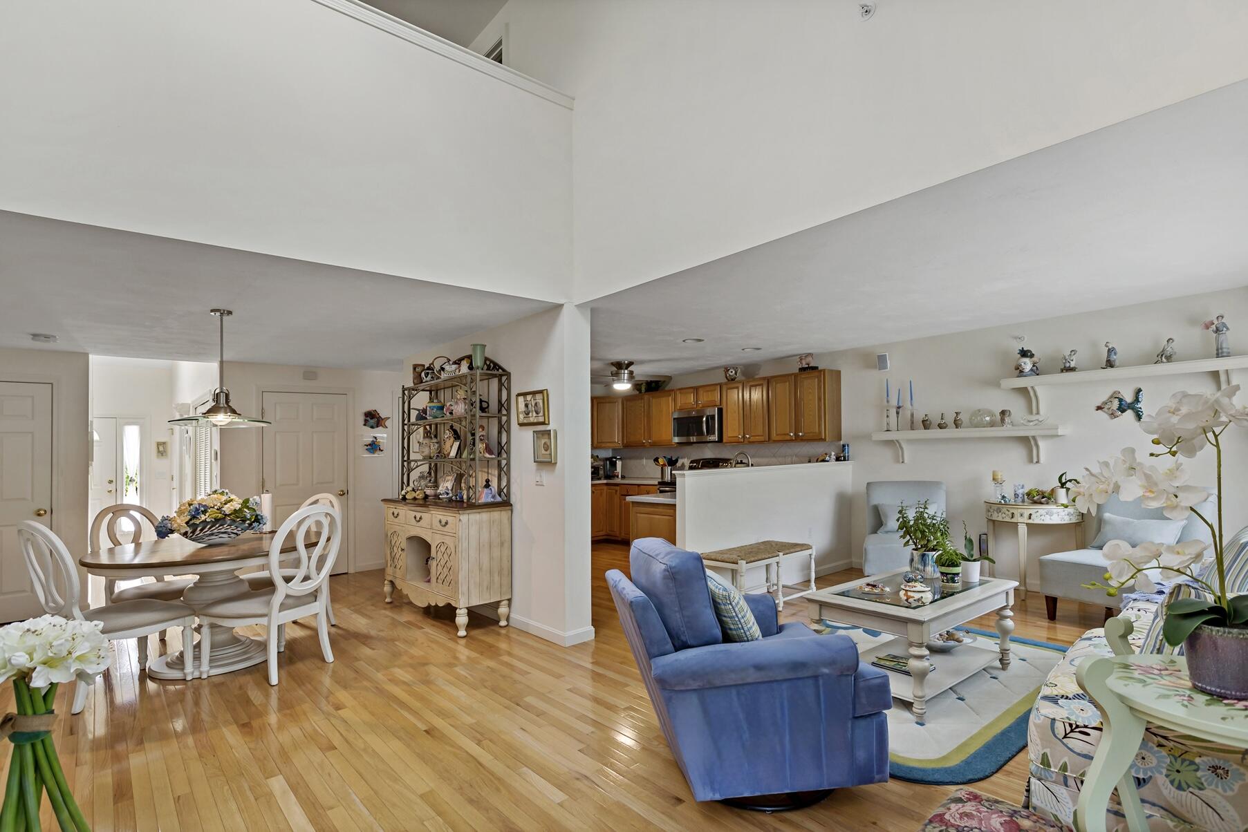 8 Chippers Lane Mashpee, MA 02649 - Photo 3 of 36 a living room with furniture and wooden floor