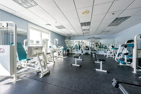 a view of a room with gym equipment