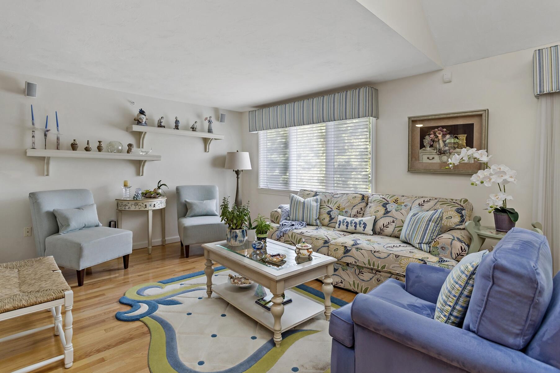 8 Chippers Lane Mashpee, MA 02649 - Photo 7 of 36 a living room with furniture and a large window