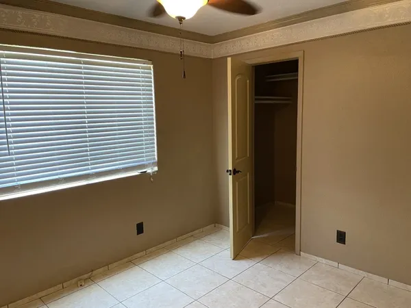 an empty room with window