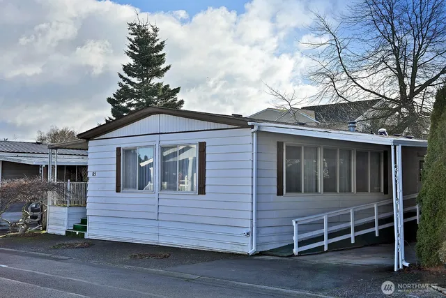 a front view of a house with a garage