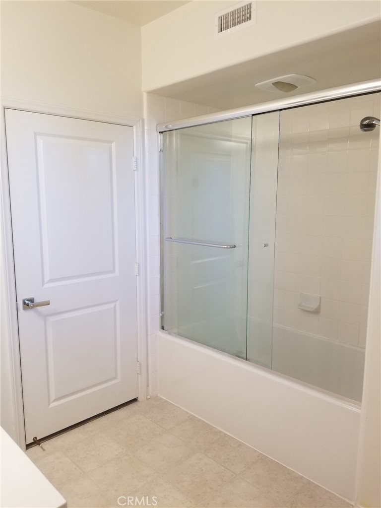 74 Rose Arch Irvine, CA 92620 - Photo 17 of 21 a bathroom with a shower