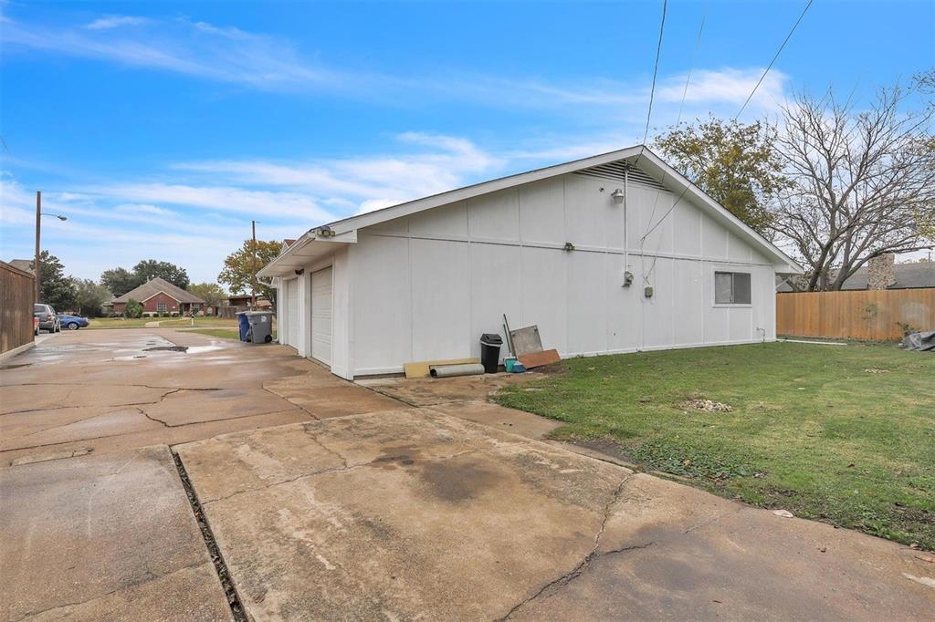 3226 Barnes Bridge Road Dallas, TX 75228 - Photo 3 of 27 a view of a house with a yard