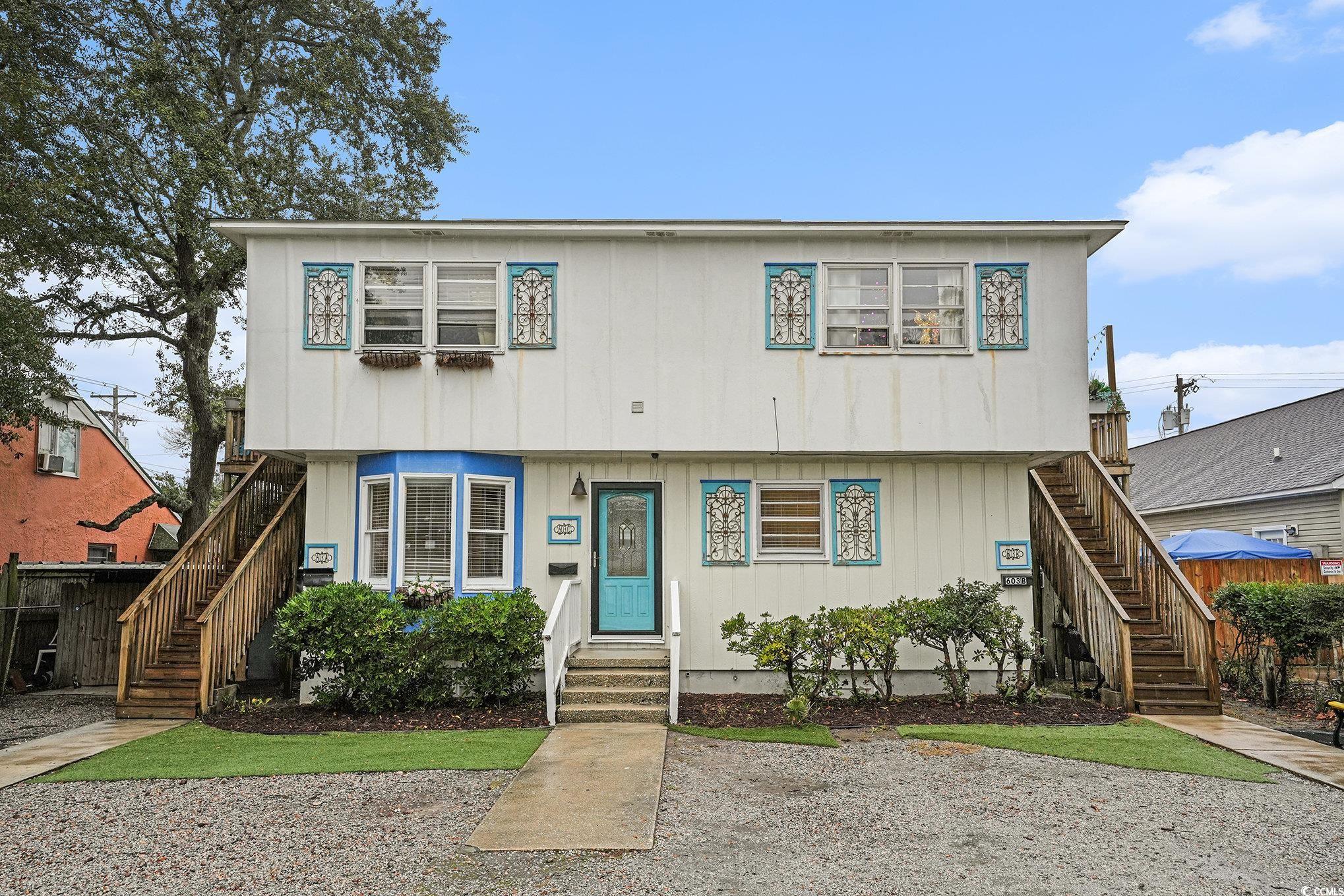 603 Maple Street Myrtle Beach, SC 29577 - Photo 1 of 40 Colonial home with stairway