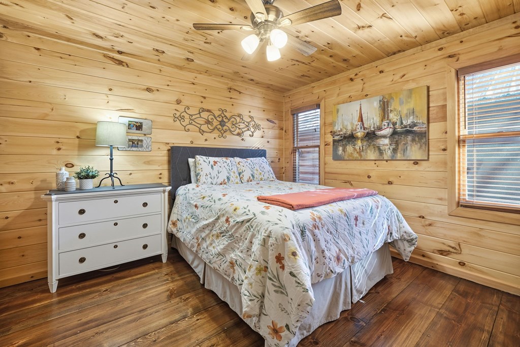 478 Cohutta Mountain Road Blue Ridge, GA 30513 - Photo 15 of 47 a bed room with a bed and a window