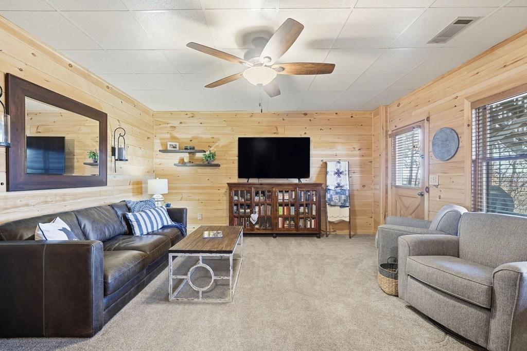 478 Cohutta Mountain Road Blue Ridge, GA 30513 - Photo 19 of 47 a living room with furniture and a flat screen tv