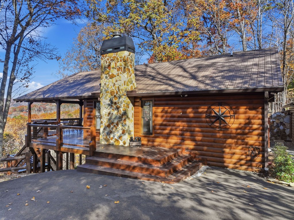 478 Cohutta Mountain Road Blue Ridge, GA 30513 - Photo 28 of 47 a view of a house with porch and sitting area