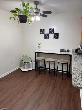a view of dining room and wooden floor