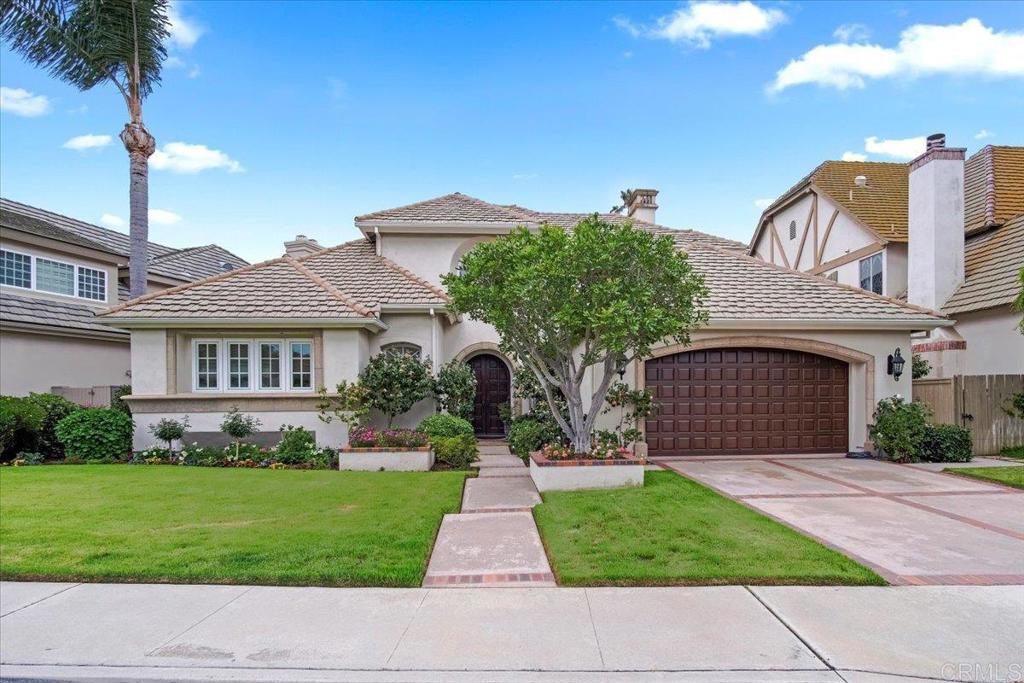 16050 Avenida Calma Rancho Santa Fe, CA 92091 - Photo 1 of 1 a front view of a house with a yard and potted plants