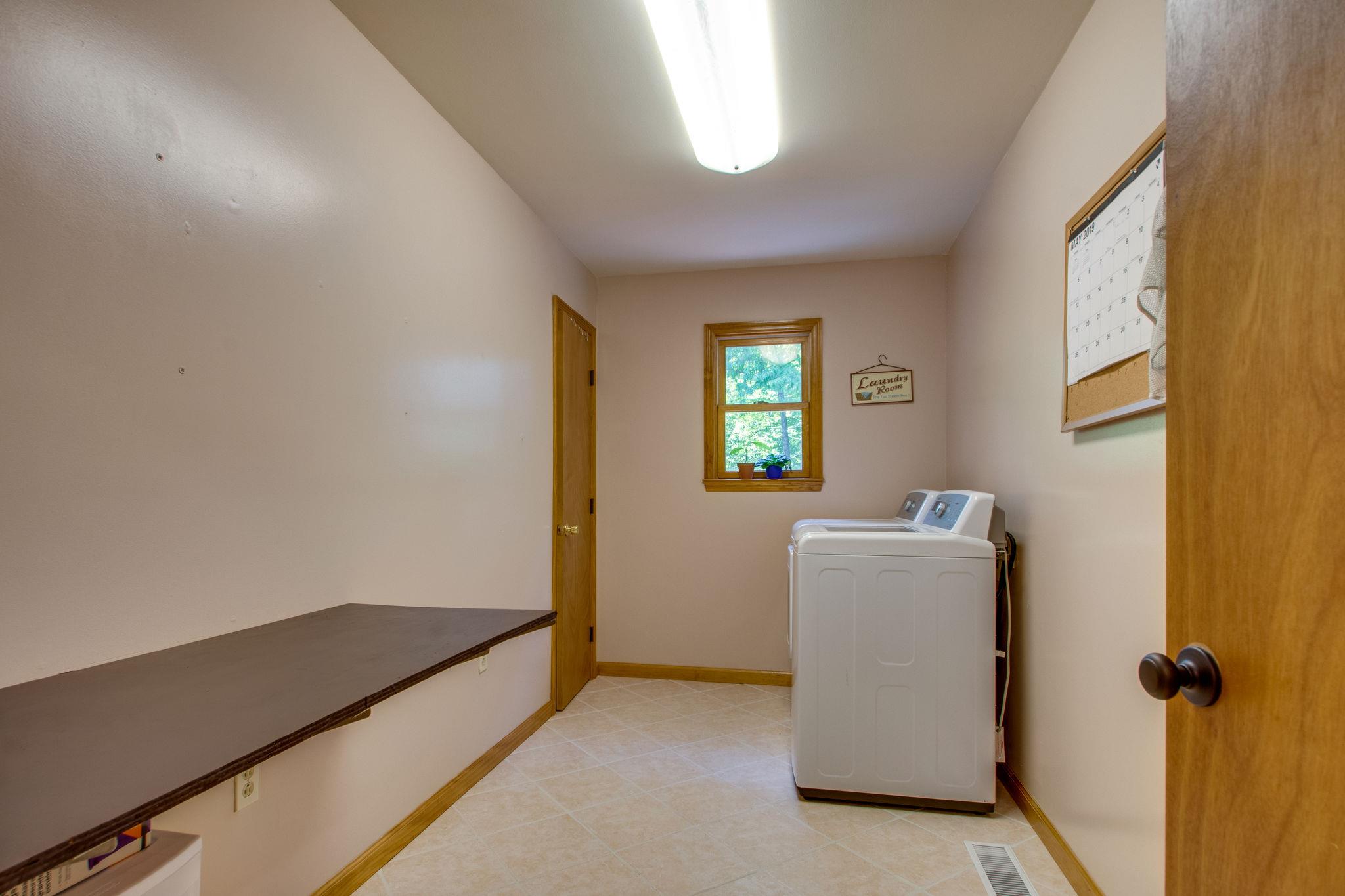1017 Deer Ridge Road Kingston Springs, TN 37082 - Photo 21 of 29 a view of an empty room and a window