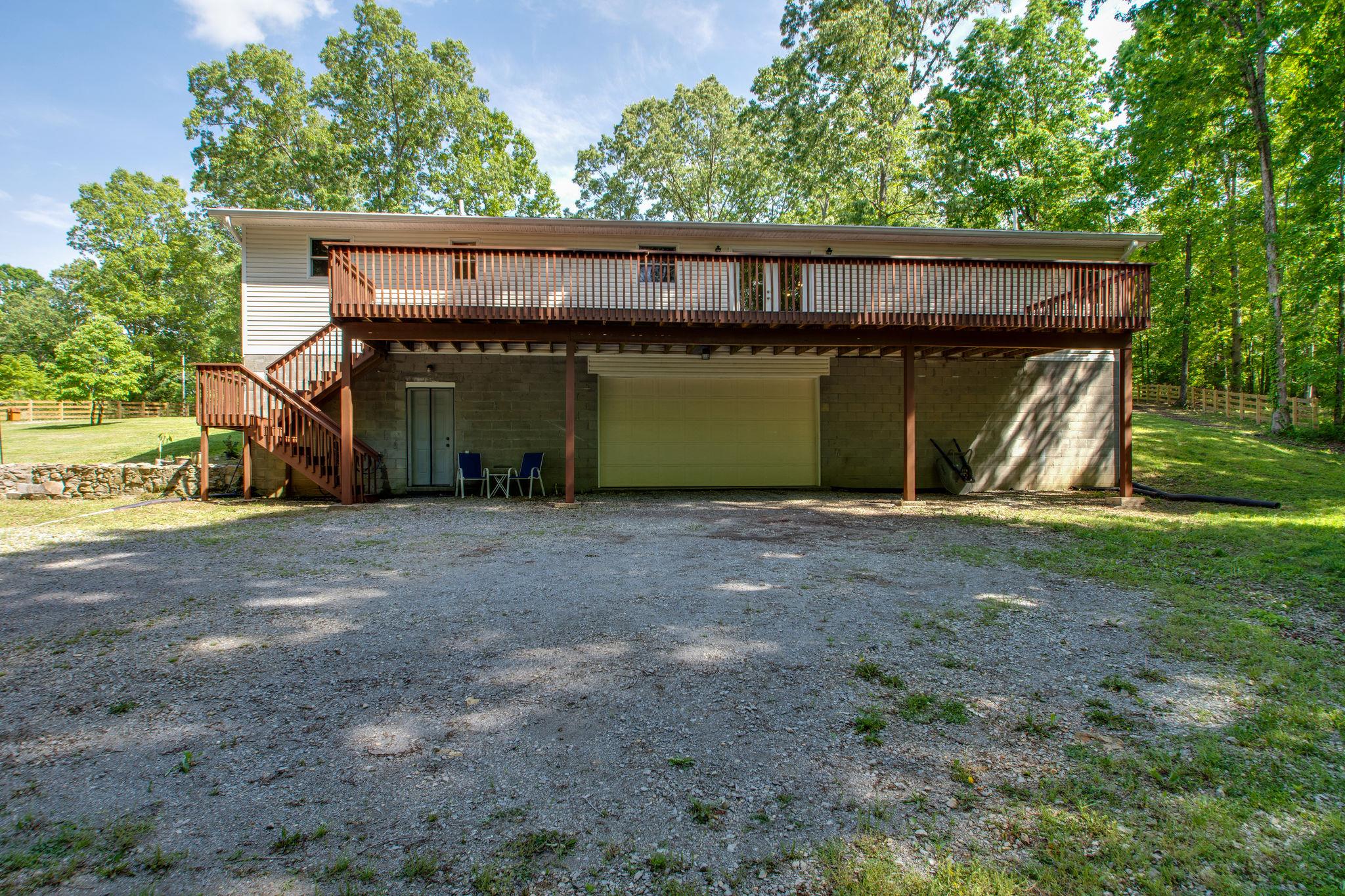 1017 Deer Ridge Road Kingston Springs, TN 37082 - Photo 26 of 29 a view of a house with backyard