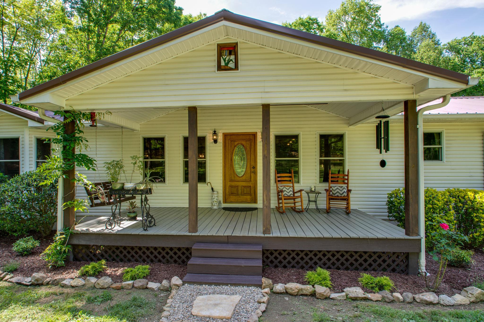 1017 Deer Ridge Road Kingston Springs, TN 37082 - Photo 4 of 29 a front view of house with yard