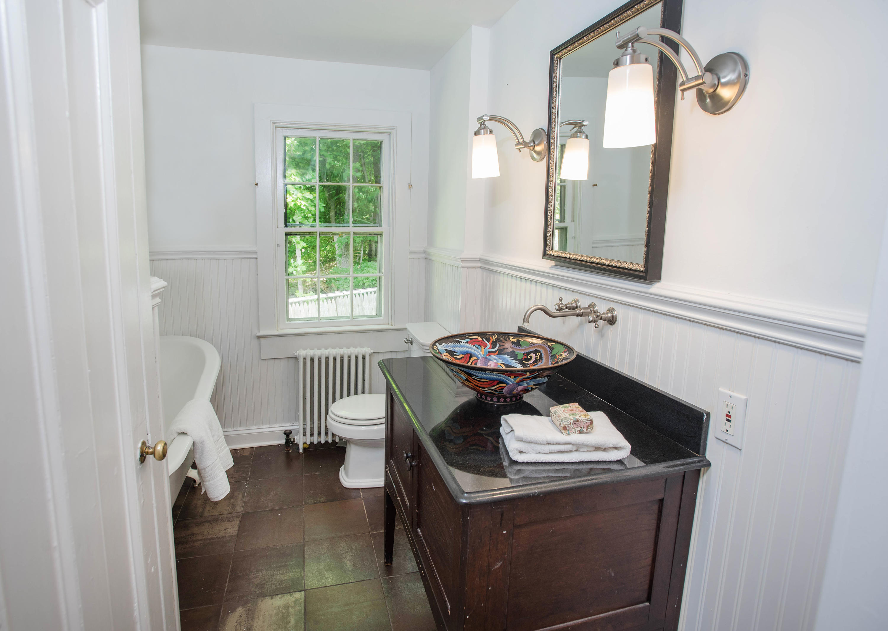 2884 Long Ridge Road Stamford, CT 06903 - Photo 12 of 20 a living room with a sink and a mirror