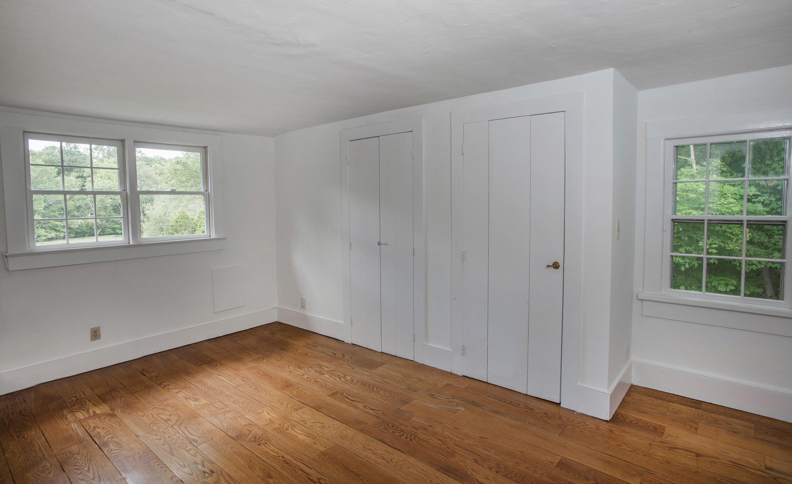 2884 Long Ridge Road Stamford, CT 06903 - Photo 16 of 20 wooden floor in an empty room with a window